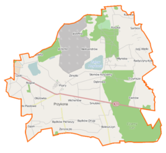 Mapa konturowa gminy Przykona, po prawej nieco na dole znajduje się punkt z opisem „Ewinów”