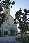 Kirche Rapperswil, Eingangsportal mit Inschrift «Dein Wort ist die Wahrheit» (Joh 17,17)