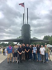 Former crew with the sail from the USS Indianapolis(SSN 697) at the Indiana Military Museum at Vincennes, Indiana