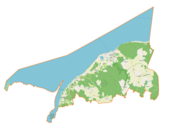 Mapa konturowa gminy Tolkmicko, blisko centrum na prawo znajduje się punkt z opisem „Tolkmicko”