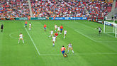 Queensland Roar, in orange, playing at Suncorp Stadium against Newcastle.