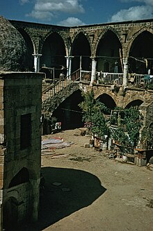 A two story courtyard with balconies