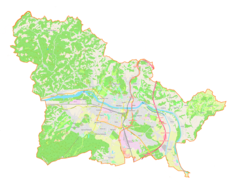 Mapa konturowa gminy miejskiej Mariboru, w centrum znajduje się punkt z opisem „Słoweński Teatr Narodowyw Mariborze”