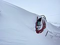 Kässbohrer PistenBully 100 no. 311 buried under heavy snow at McMurdo Station (Antarctica)