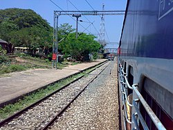 Train approaches Kadakkavoor Railway Station (Photography by Binoy.J.S on 15 March 2011)