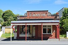 A brick storefront with a sign reading F. MARTIN