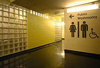 Glass brick labyrinths, used to obscure clear visual line of sight into women's washroom on the left, and men's washroom on the right.