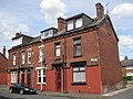 Older street-fronted terrace. House pictured known as the McMansion.