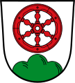 Stadt Klingenberg a.Main In Silber über grünem Dreiberg ein sechsspeichiges rotes Rad.