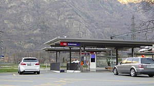 Canopy-covered platform with mountains in the distance