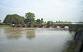 Photograph of an old bridge on the Ganges Canal (constructed before 1854 during East India Company rule in India). The photograph was taken from a moving car.