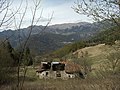 Mount Camiolo di Mezzo, in the foreground the ruins of the barn known as the Fabbrica, built in 1877 by Filippo Viani, in the background the barns known as the Pir