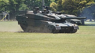A Type 10 leans forward on its suspension as it decelerates