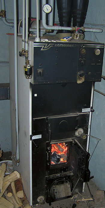 Wood-fired central heating unit