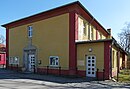 Genossenschaftshaus der Siedlung Eden mit Nebengebäude