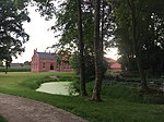 Historischer Garten Tammen mit Blick auf das repräsentative Herrenhaus