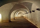 Colonel Bailey's Dungeon, an underground vault with arches and with hooks on walls to tie down prisoners