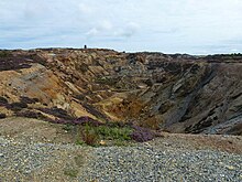 A large crater caused by mining at a quarry