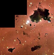 Thackeray's Globules, a set of Bok globules in the H II region IC 2944, taken with the WFPC2 instrument on the Hubble Space Telescope