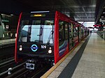 B07 stock train at Heron Quays DLR station