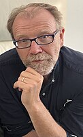 George Saunders award-winning American writer of short stories, essays, novellas, children's books, and novels. Professor at Syracuse University.