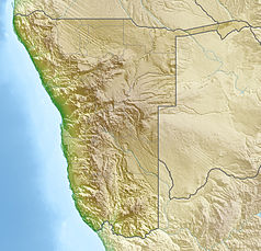 Mapa konturowa Namibii, na dole znajduje się punkt z opisem „Apollo 11”