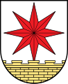 Gemeinde Bösingfeld gültig bis 31. Dezember 1968 "In Silber ein achtstrahliger roter Stern über einer natürlich sandsteinfarbenen Zinnenmauer im Schildfuß."
