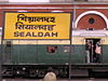 A train passes the Sealdah station sign board in 2008