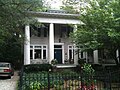 Four-Square with Greek Revival columns added in 1970s (before historic zoning)