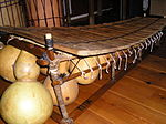 A fixed-key balafon, showing resonators with membrane holes