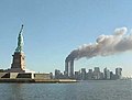 Image 12The World Trade Center on fire and the Statue of Liberty. (from Contemporary history)