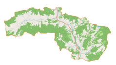 Mapa konturowa gminy Pcim, na dole nieco na prawo znajduje się punkt z opisem „Parafia św. Mikołaja w Pcimiu”