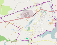 Mapa konturowa Trzemeszna, w centrum znajduje się owalna plamka nieco zaostrzona i wystająca na lewo w swoim dolnym rogu z opisem „Jezioro Kościelne”