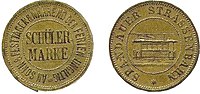 Straßenbahnmünzen für Schülerfahrten, die anstelle von Fahrscheinen ausgegeben wurden, um 1910