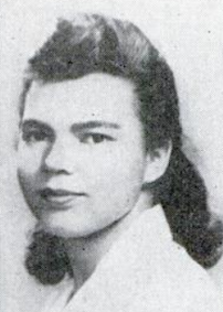 A young fair-skinned African-American woman with shoulder-length dark hair, wearing a white collared blouse