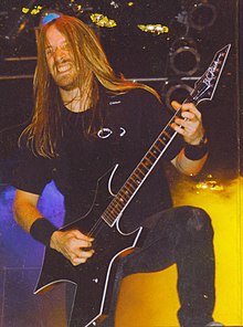 Merritt Gant on stage with Overkill in the early 1990s