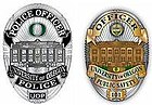 Badges of the University of Oregon Police Department.