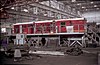 Interior of Cardiff workshops, showing diesel locos under repair in 1982