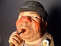 Closeup of face Woodcarving of a hobo By Carl Olof Trygg circa 1961