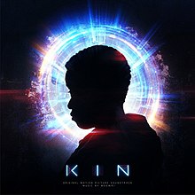 The silhouette of a person in front of a blue and purple halo. The title of the album appears below the figure.