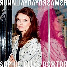 Ellis-Bextor looks in the distance, wearing a white, black-striped coat; she is standing against a display case of a store, where her reflection is seen. The top of the image shows the text "Runaway Daydreamer" in a Cyrillic script-inspired typeface, while its bottom has the text "Sophie Ellis-Bextor" in the same font.