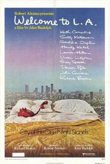 A distant cityscape, a bed with a red telephone the receiver on the pillow, and the tagline "The city of the one night stands"