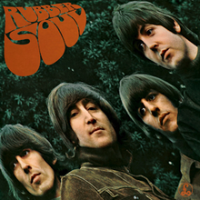 A photo of the Beatles – George, John, Ringo, and Paul. The image is diagonally warped. On the top left in a very curvy font reads the text "Rubber Soul"