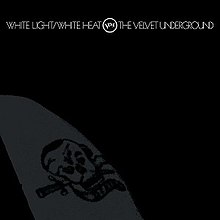 The album cover; a faint image of a skull tattoo. It is difficult to distinguish the tattoo, as the image is black, printed on a slightly lighter black background. On this cover, the album name, Verve logo, and band name are all on one line.