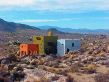 Side from hillside above dwelling.