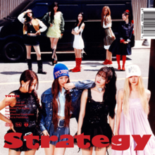 Twice members pose in front of a black van, with 'Strategy' in bold red text at the bottom of the image.