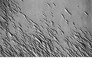 Medusae Fossae Formation as seen with Mars Odyssey's THEMIS. Notice elongated formations called yardangs.