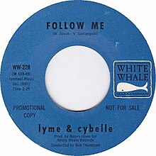 A vinyl 7-inch single label that is blue, issued by White Whale Records. The label depicts the A-side of single WW-228, which is lyme & cybelle's "Follow Me", released in 1966.