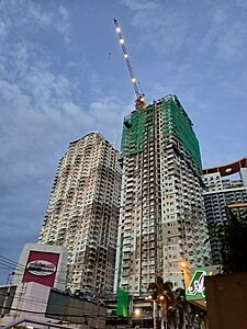 The Manhattan Plaza towers, with the Manhattan Heights Tower B in the background