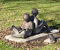 Statue of a girl and a boy reading. This is located in John Dam Plaza, Richland. (January 2006)